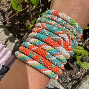 8 of the Roll-On® Bracelets SORBET Aid Through Trade